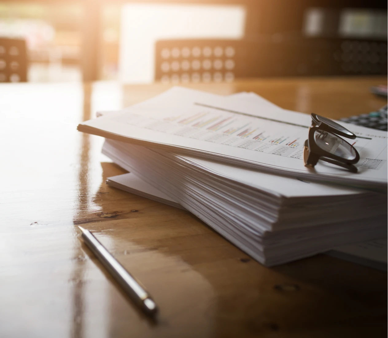 Pen and documents on desk