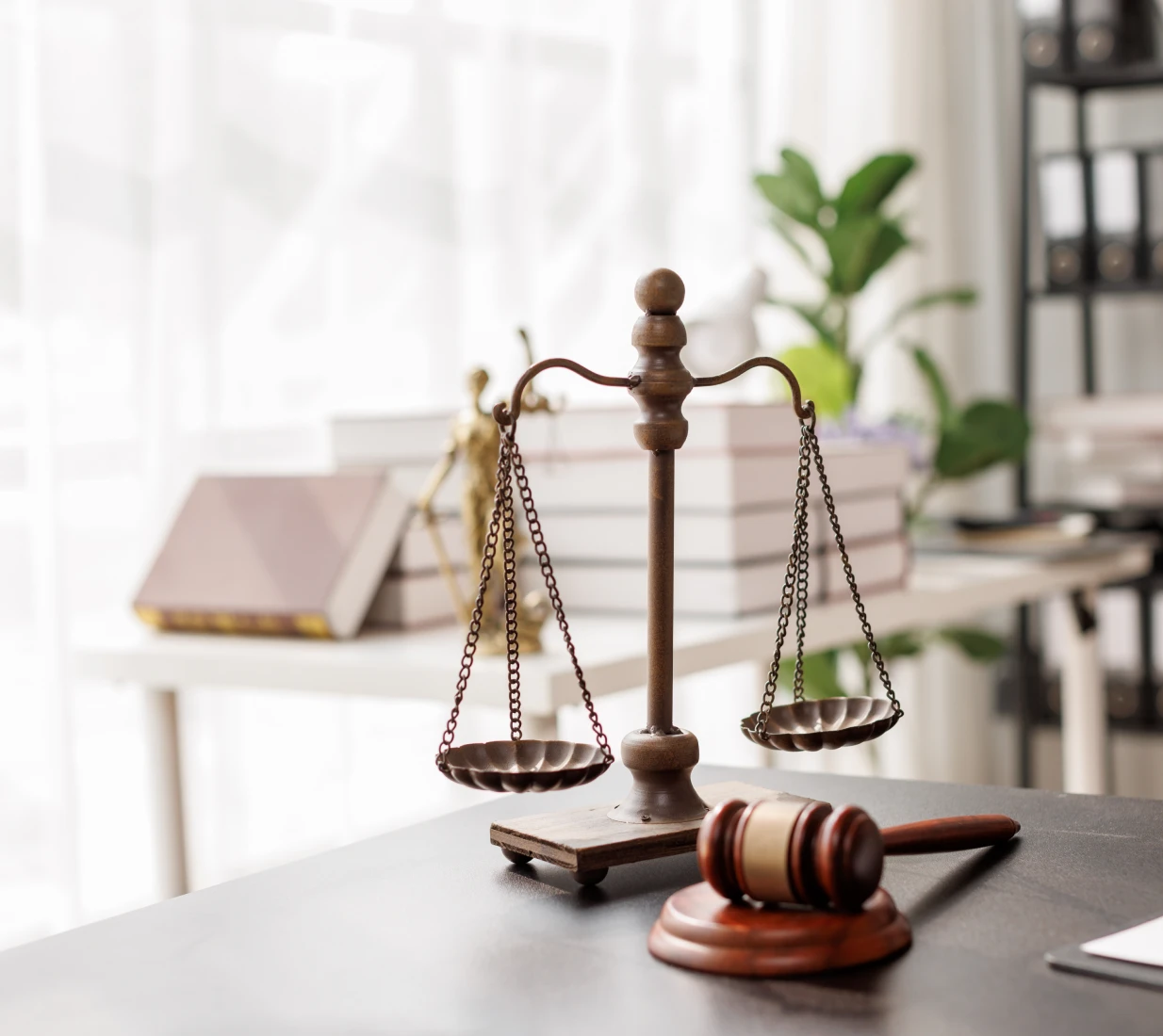 Legal office with scales and gavel.