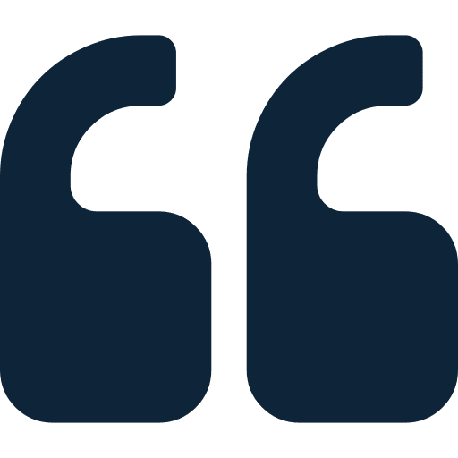 A green quotation mark symbol on a white background.